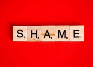 How I Am Combatting the Stress-Shame Cycle in My Marriage Scrabble letters spelling the word "shame" on a red background.