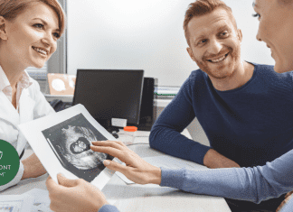 An Infertility Nurse’s Perspective: What to Expect From Your Infertility Doctor fertility doctor with couple