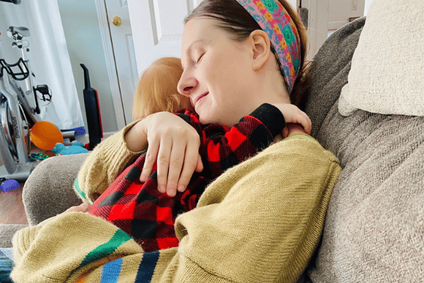 Mom hugging her toddler