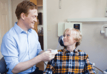 Advanced Dentistry of Vermont Gave this Mom a New Reason to Smile dentist smiles at teen patient