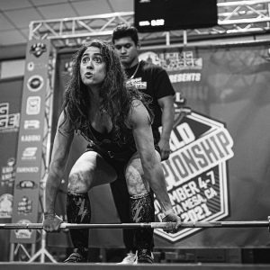 woman lifting weights in a competition