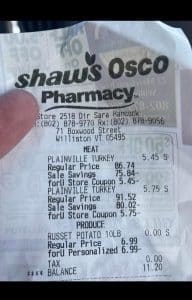 receipt showing massive savings with couponing