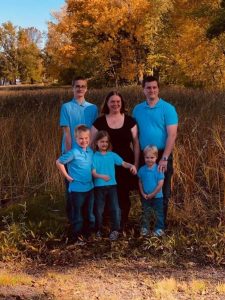 family wearing blue shirts