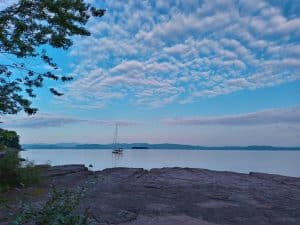 View of Lake Champlain under puffy little cloud clusters