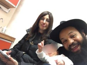 Mother with infant in Doctor's office