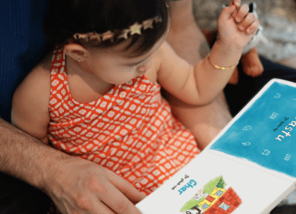 Little Patakha: Teaching Children to Celebrate Difference parent reading a LIttle Patakha book to a toddler