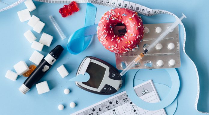 What I Wish I Knew About Living with Gestational Diabetes A wide array of diabetes-related paraphernalia. A black finger stick and reader. An empty syringe. Sugar cubes and a pink frosted donut.