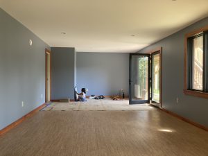 Toddler drawing on dry erase board in newly renovated room