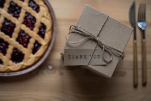 Gift box with tag that reads "Thank you"