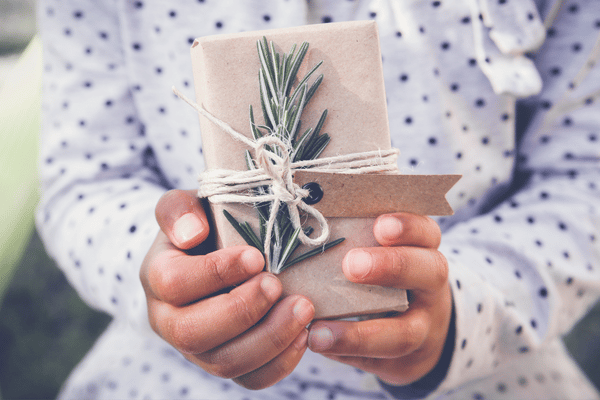 child regifting a toy in an alternative gift giving tradition