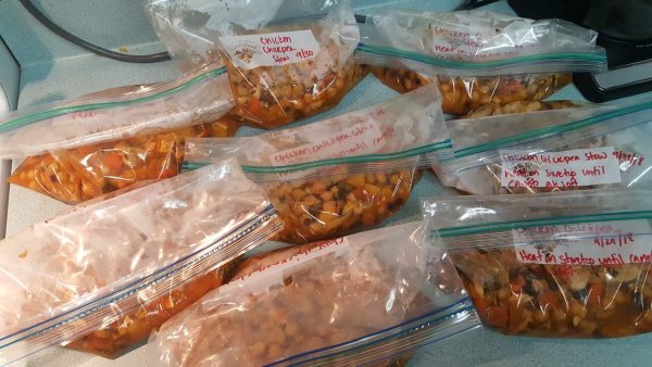 gallon sized freezer bags with stew in them on a countertop
