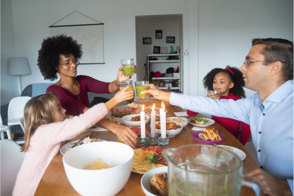 a family having dinner together at the table