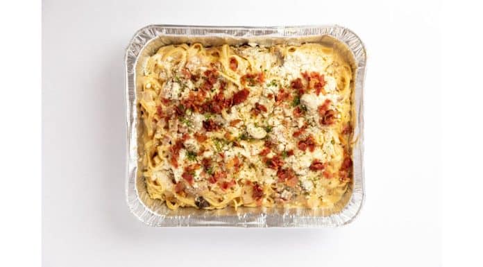 The What, Why, and How of Planning a Meal Swap an aluminum pan with a pasta dish