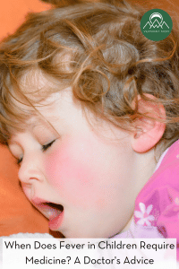 feverish child sleeping with an open mouth and flushed cheeks