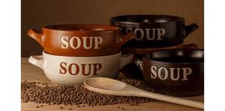 Easy Soup Recipes When You’re Low on Groceries four soup crocks with the work SOUP written on the outside of them next to a wooden spoon