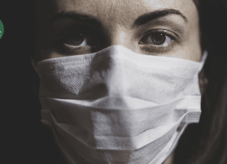 The Gray Zone of Chronic Illness woman with a mask