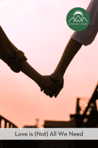 backlit hand holding