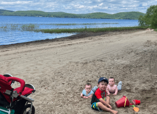 Ultimate Summer Fun for Kids in Milton, Vermont Kids sitting at the beach.
