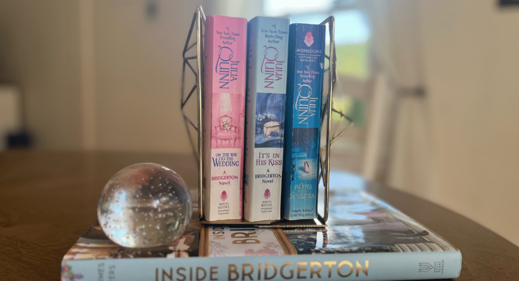 a stack of the hottest Bridgerton books.