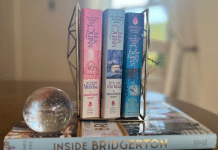 The Definitive Ranking of the Hottest Bridgerton Books a stack of the hottest Bridgerton books.