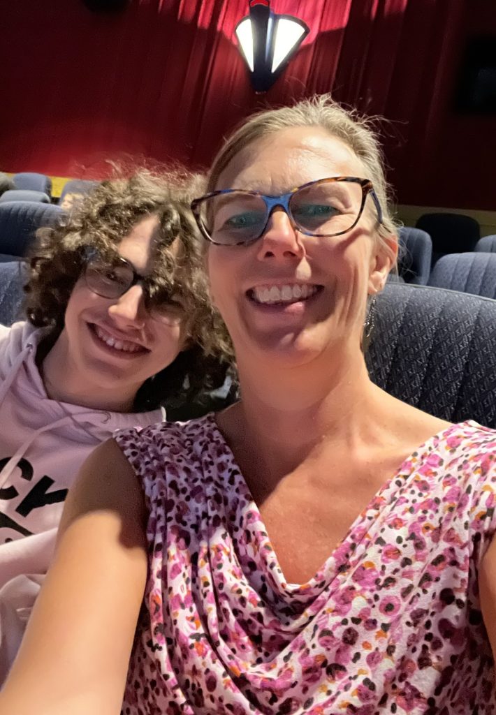 Mother and son at the movie theater
