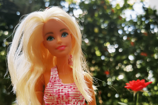weird Barbie, or well-loved Barbie, this doll poses in confidence and beauty