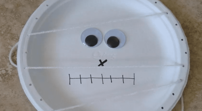 A featured image for a blog post about a Halloween mummy craft.