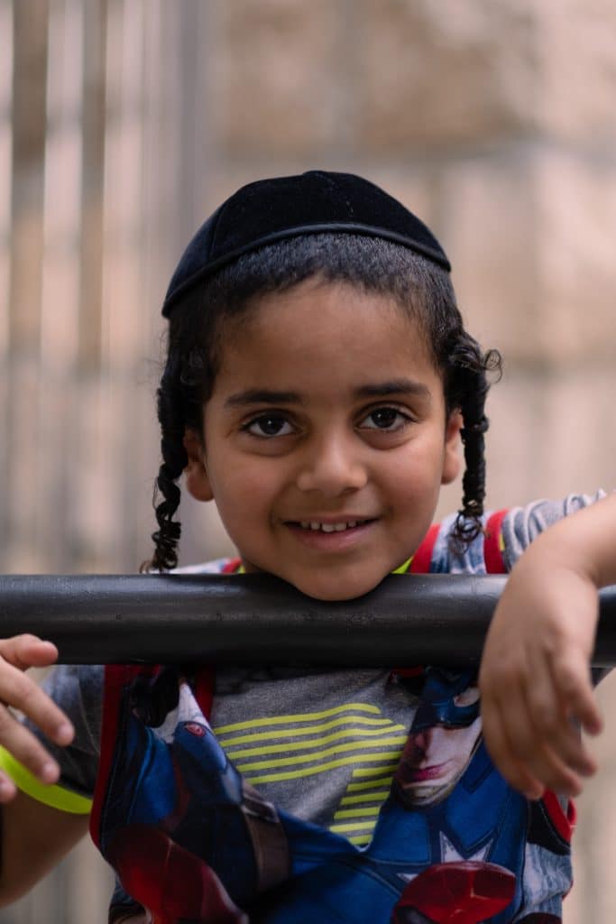 young Jewish boy smiles