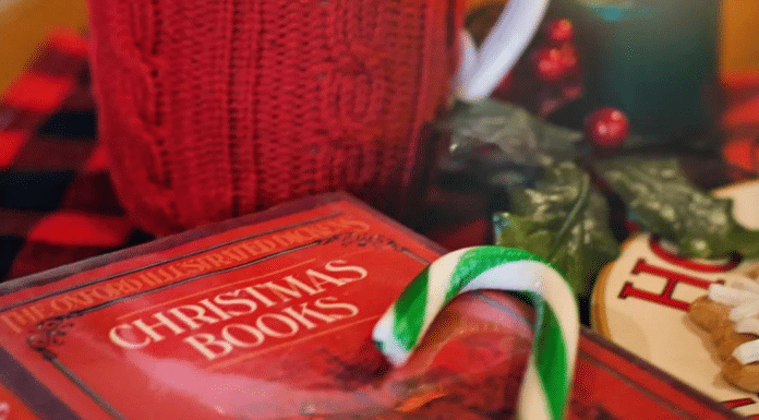 12 Children’s Christmas Books Your Family Will Love A children's christmas book with a candy cane and a mug.