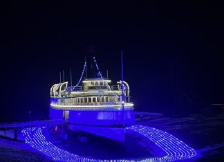 7 Places to See Holiday Lights in Vermont ship covered in holiday lights at Shelburne Museum, Vermont