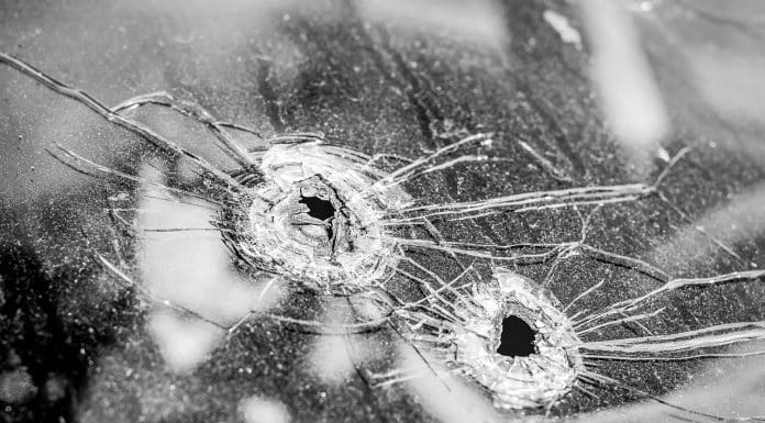 Mass Shooting: Coping when Tragedy Strikes Close to Home bullet holes in glass