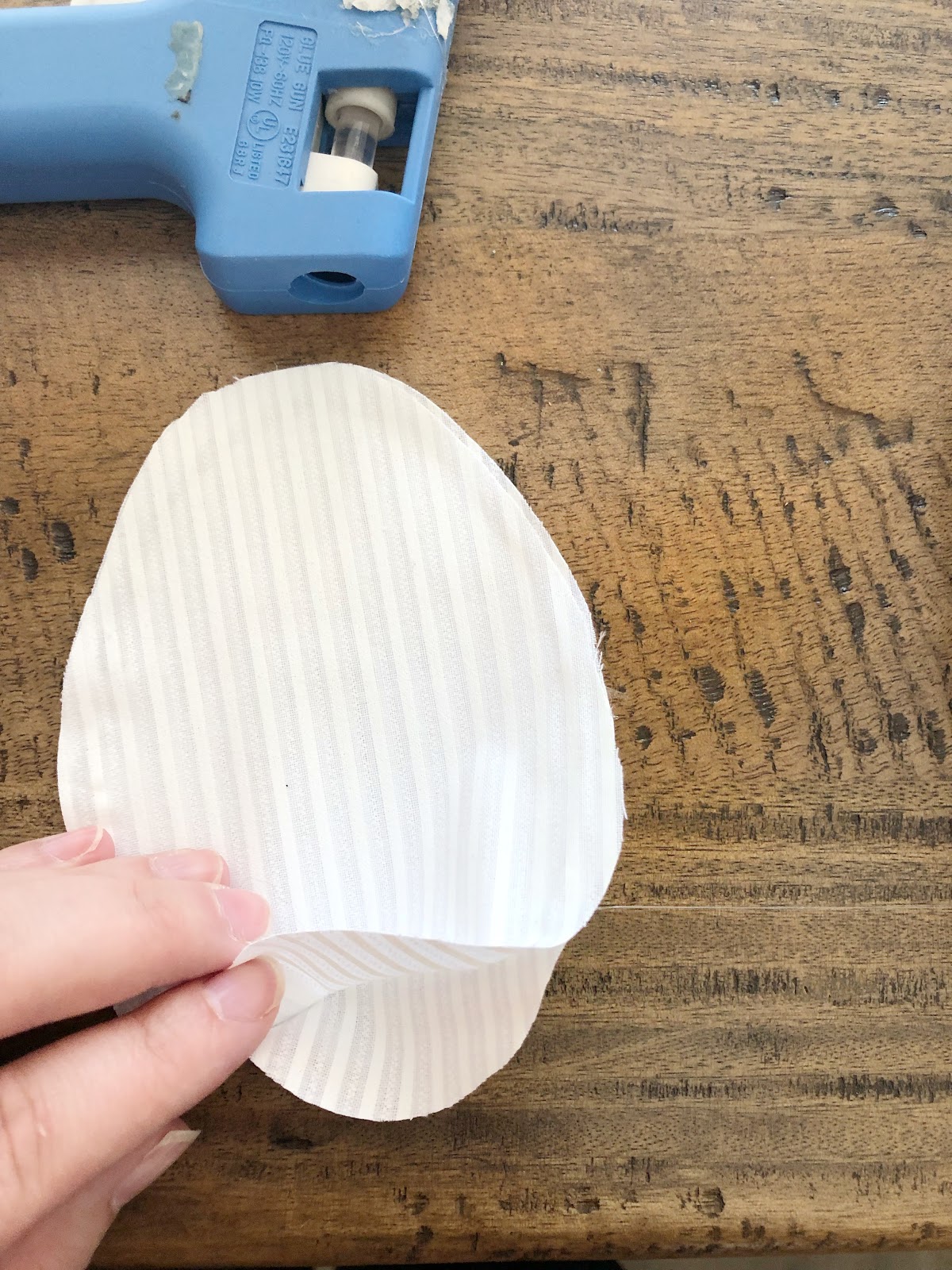 fabric egg being glued together