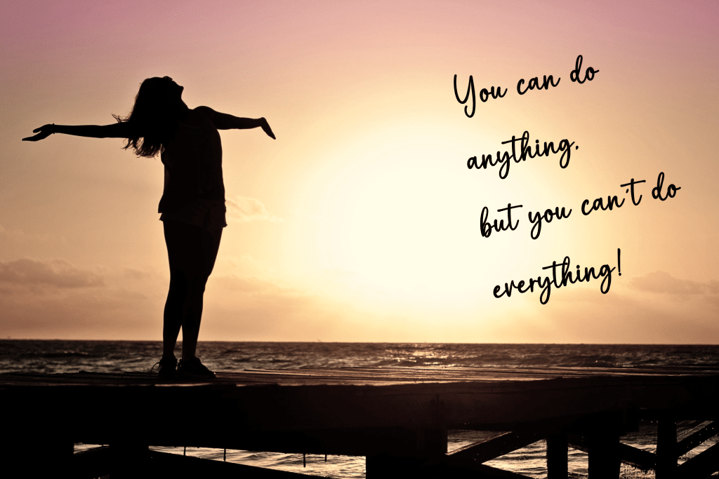 Woman against the sunset with the phrase "You can do anything, but you can't do everything" on it.