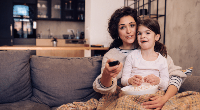 Momspiration Moment: Why Chilli from Bluey Inspires Me Little girl watching tv with mom