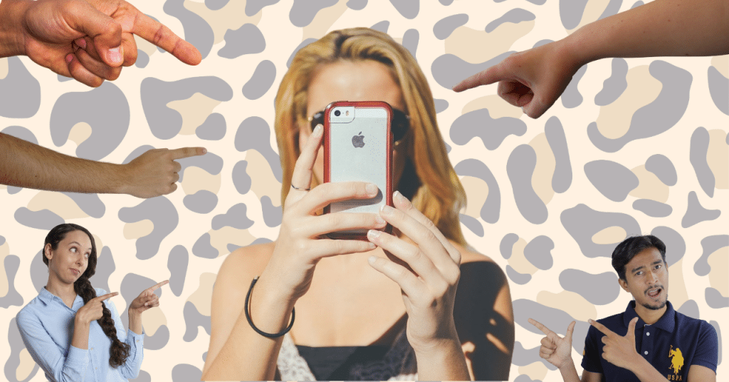 person with long blond hair holds a cell phone camera in front of their face, while there are various hands pointing at them from all directions.