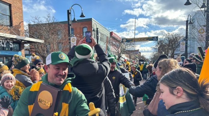 The UVM Men’s Soccer National Championship Matters to Vermont Families UVM men's soccer coach Rob Dow in celebration parade in downtown Burlington, Vermont