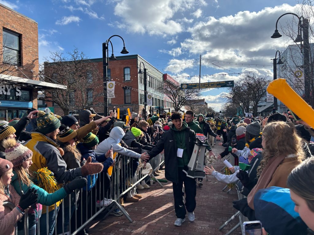 UVM men's soccer team in celebtration parade in Burlington, Vermont