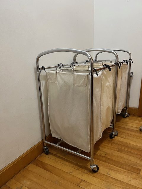 a laundry sorter is a part of the author's key 10 organizing tips for moms